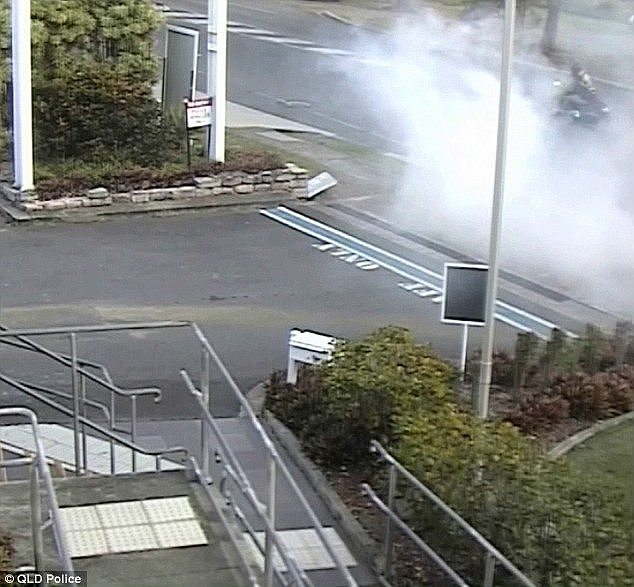 A brazen motorcyclist performed an illegal burnout outside Springwood police station in Queensland on September 13