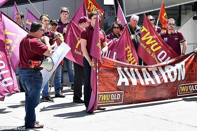 'Behind the shiny facades and the slick airline lounges, what we've got are airport workers under pressure' TWU National Secretary Michael Kaine told reporters as he attended the rally