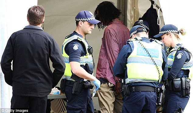 A man, 27, (pictured) remains in custody after he was arrested by police outsideÂ  Government House in Melbourne on Thursday morning