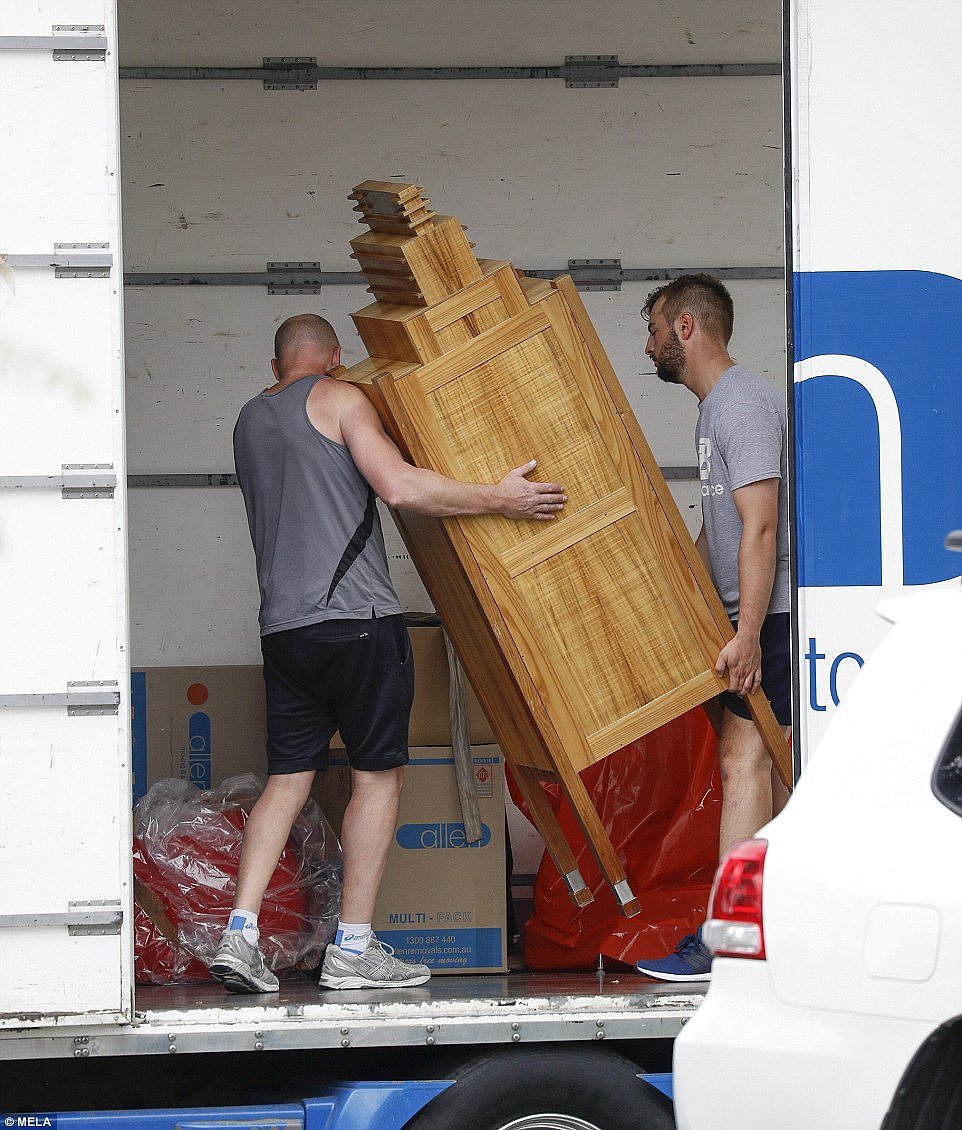 Moving out: On Saturday, removalists were photographed at the estranged couple's Toorak property, loading up a truck