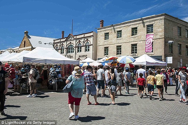 Tasmania (Hobart's Salamanca Markets pictured) came fourth overall but was closing the gap with the ACT by having Australia's strongest population growth and business investment