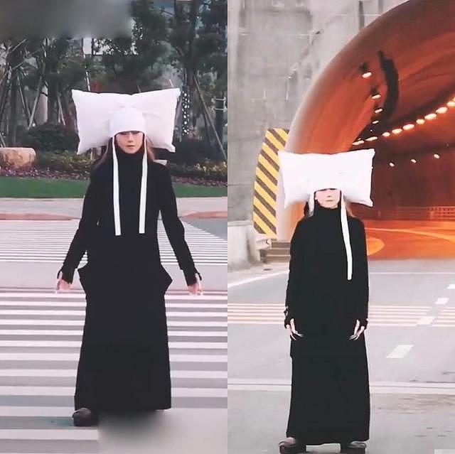 杨丽萍再现奇葩造型，头顶枕头站在隧道口，被指无视交通规则
