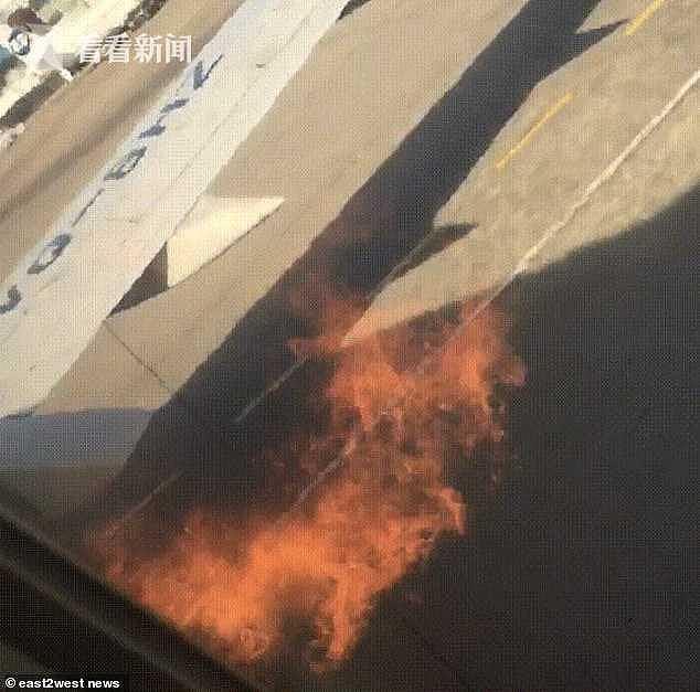 波音737客机起飞前引擎着火 3名乘客站机翼上准备跳下被劝回