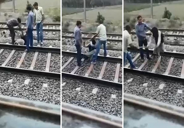 印胆大男子将身体悬挂火车外不听劝遭乘客群殴（视频组图） - 2