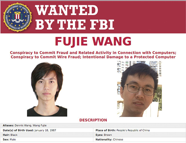 Fujie Wang和其他黑客成员，被控侵入美国电脑系统的活动。 王被控四项罪。 （美联社）