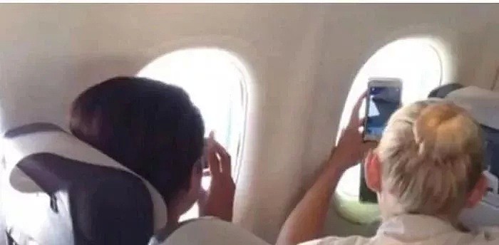 只因在飞机上拍了一张照片发上网，澳洲亚裔乘客恐遭6年监禁，$7.5万罚款...（组图） - 8