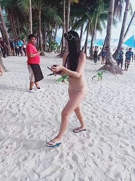 一条线比基尼！华人女游客大胆着装，在菲律宾被罚款！警方：只穿了根绳子 （组图） - 1