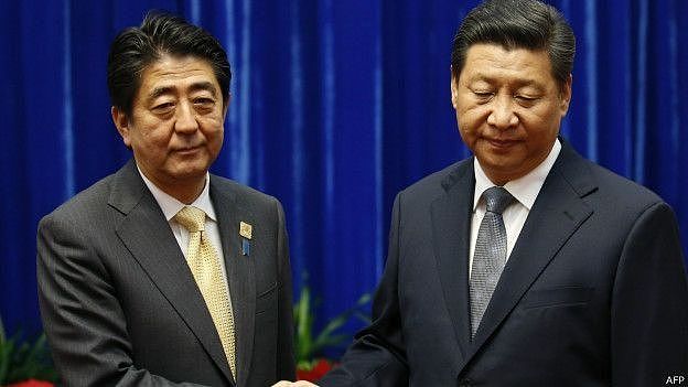 2014年，习近平与安倍晋三“破冰”握手。