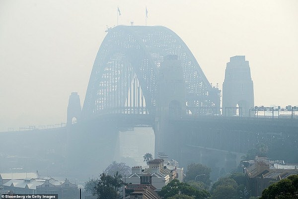 21698454-7759439-The_Sydney_Harbour_Bridge_is_shrouded_in_haze_in_Sydney_Australi-a-7_1575559168692.jpg,0