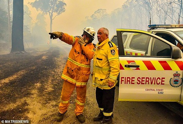 22687008-7828507-There_were_more_than_1_400_firefighters_across_NSW_working_throu-a-12_1577391215778.jpg,0