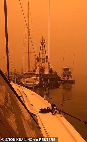 23000350-0-The_sky_darkened_by_smoke_from_bushfires_is_seen_in_Port_of_Eden-m-12_1578194697504.jpg,0