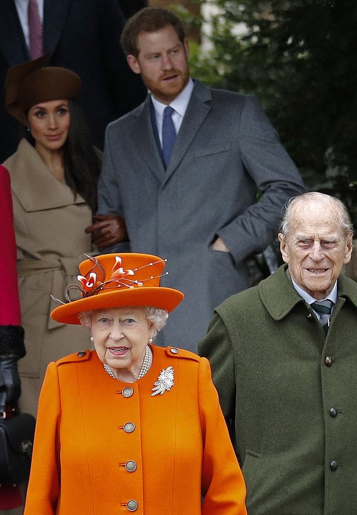 英女王13日发声明表示，同意在过渡时期，让哈利梅根一半时间在加拿大居住。 (Getty Images)