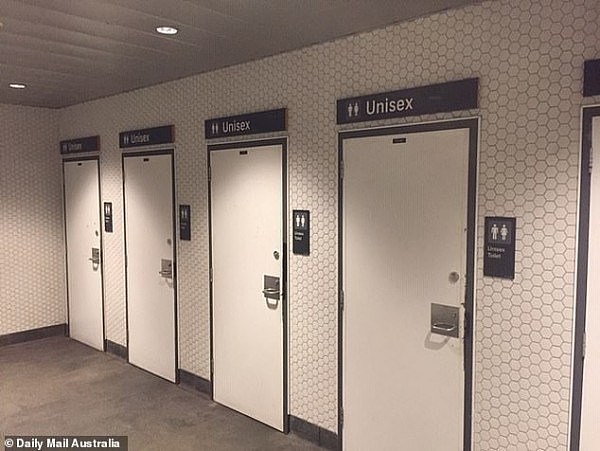 23804666-7923313-The_rows_of_unisex_toilet_cubicles_which_all_have_their_own_sink-a-3_1579837042137.jpg,0