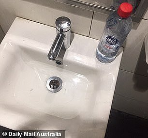 23804670-7923313-A_water_bottled_was_left_perched_on_the_side_of_the_sink_picture-a-6_1579837042422.jpg,0