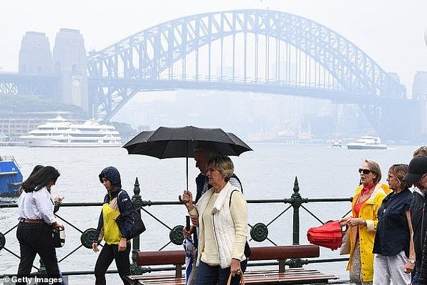 24278176-7966707-Sydneysiders_will_be_forced_to_take_out_their_umbrellas_once_aga-a-2_1580852085067.jpg,0