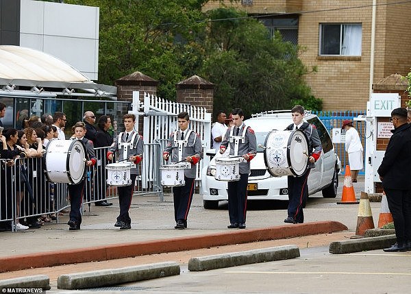 24523286-7985737-Drummers_from_the_King_s_School_led_the_procession_walking_ahead-a-8_1581310607482.jpg,0