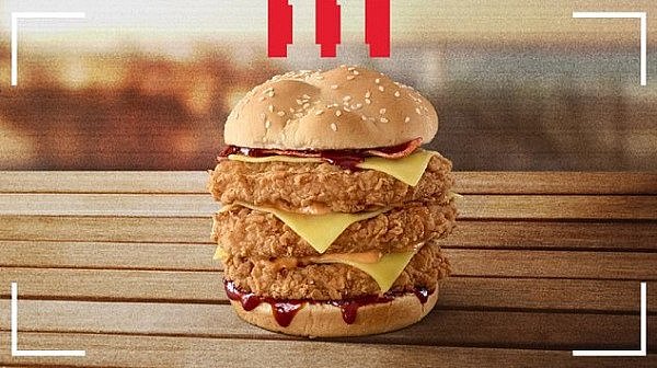 25009784-8027677-KFC_s_new_Triple_Stacker_Burger_which_is_available_to_customers_-a-8_1582264078730.jpg,0