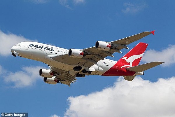 25610798-8081521-Qantas_said_on_Friday_it_will_cut_more_international_flights_thi-a-11_1583472574251.jpg,0