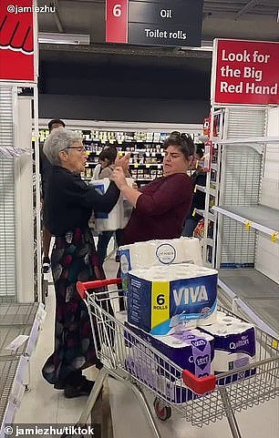 25681014-8087685-Customers_pictured_at_a_Coles_supermarket_fight_over_toilet_pape-a-3_1583649443322.jpg,0