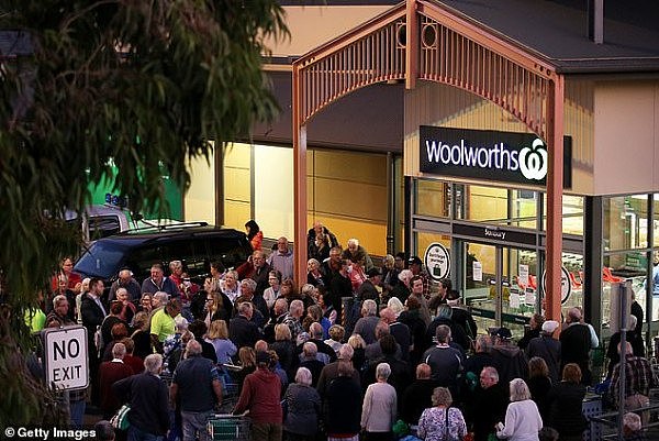 26048930-8119139-Large_crowds_of_elderly_people_are_seen_outside_Woolworths_in_Su-a-17_1584402182069.jpg,0