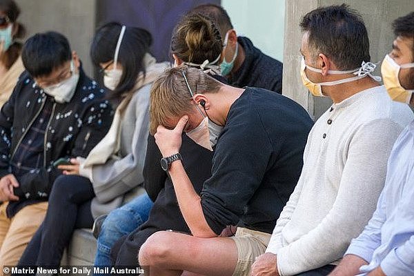 25869542-8117045-Pictured_People_waiting_outside_Royal_Melbourne_Hospital_to_be_t-a-4_1584374693206.jpg,0