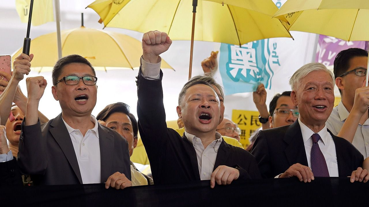 占中的直接诱因是《基本法》的政改争议。图为2019年4月24日，香港占中九子案在法庭判刑。（AP）