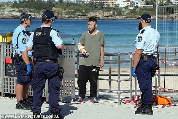 澳男无视禁令在Bondi海滩闲逛，被捕后朝警方咳嗽，扬言自己已确诊（组图） - 3