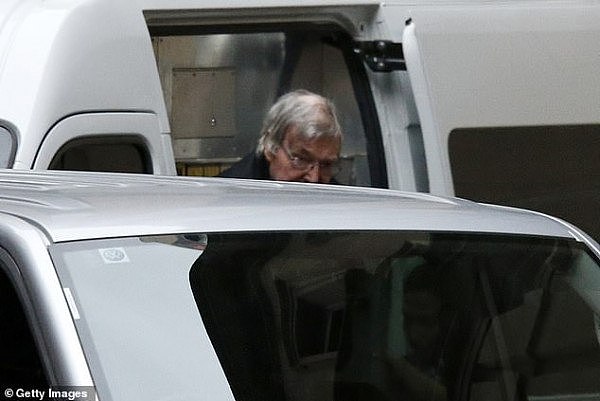 17503346-7152615-Cardinal_George_Pell_pictured_arriving_in_court_could_walk_free_-a-1_1566342968994.jpg,0