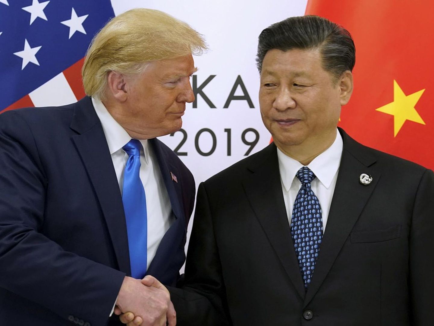 美国总统特朗普2020年3月26日曾与中国领导人习近平通电话，询问了中方有关疫情防控举措。图为特朗普与习近平2019年6月29日在大阪会晤。（Reuters）