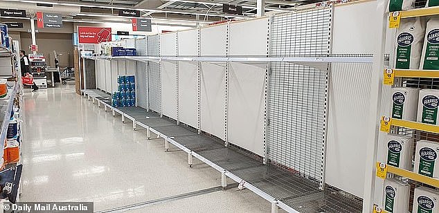 29980244-8453893-Shelves_at_Coles_in_Taylor_s_Hill_in_Melbourne_are_stripped_of_p-a-13_1592972792208 (2).jpg,0