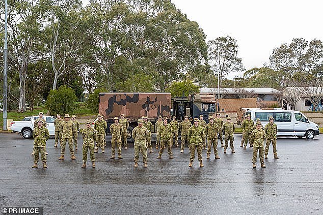 30770758-8523501-Troops_are_seen_at_Woodside_Barracks_in_South_Australia_on_Satur-a-2_1594767475916.jpg,0