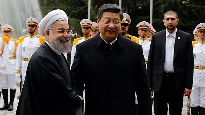 中国国家主席习近平和伊朗总统鲁哈尼。