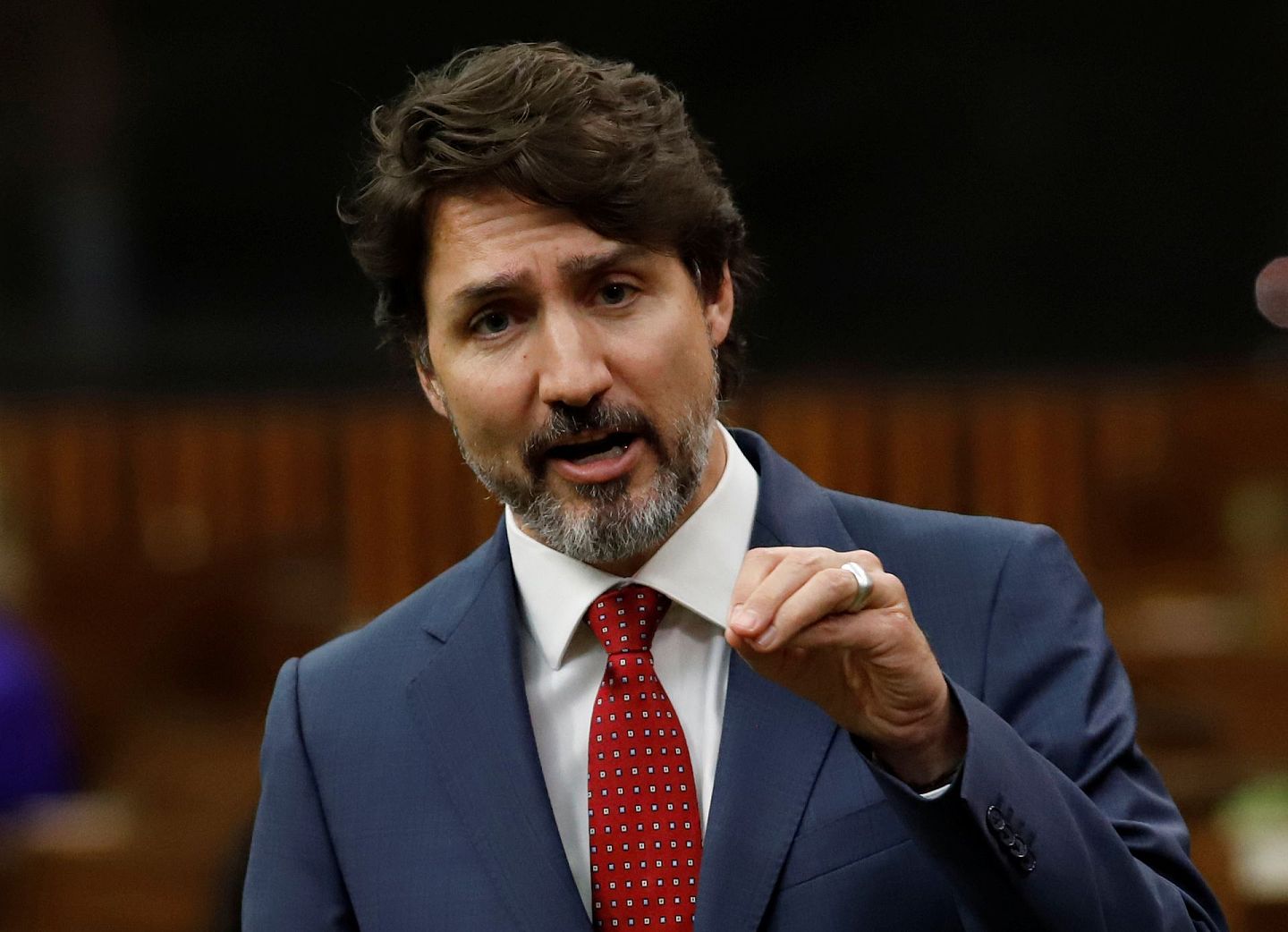 港版国安法：加拿大宣布停止执行与香港的引渡条约，并禁止出口敏感军事物品，回应北京实行《港区国安法》。总理特鲁多指将研究修改移民政策，不过未有透露详情。图为2020年6月18日，加拿大总理特鲁多出席下议院会议。（Reuters）
