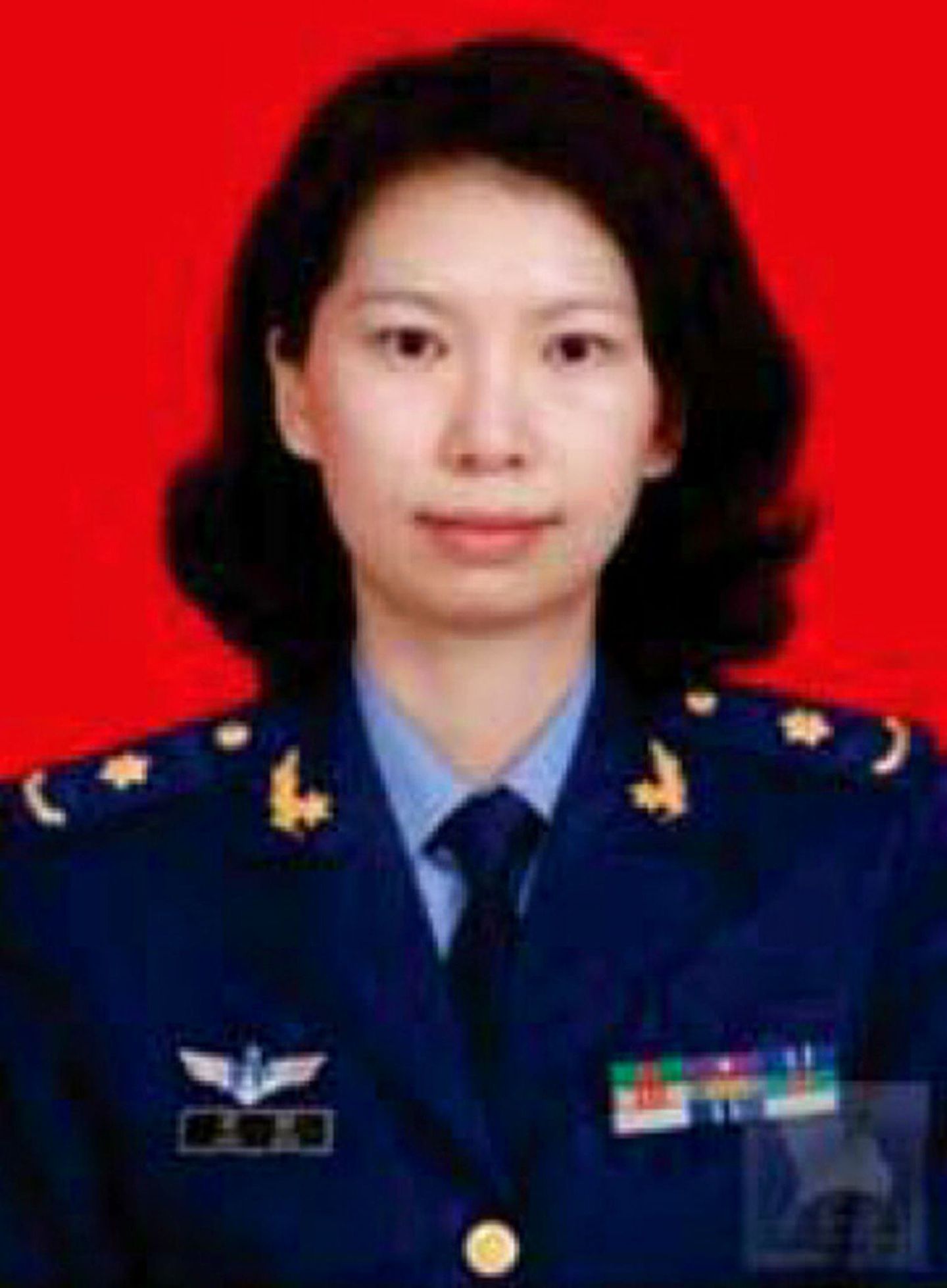 图为美国司法部提供的相片，中国女子唐娟身穿军服。（AP）