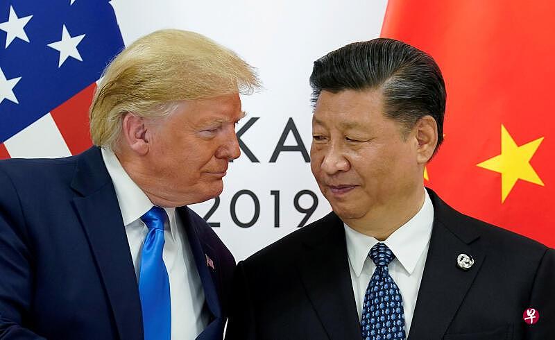 美国总统特朗普与中国国家主席习近平（右）去年在大阪G20峰会上会面。（路透社档案照片）