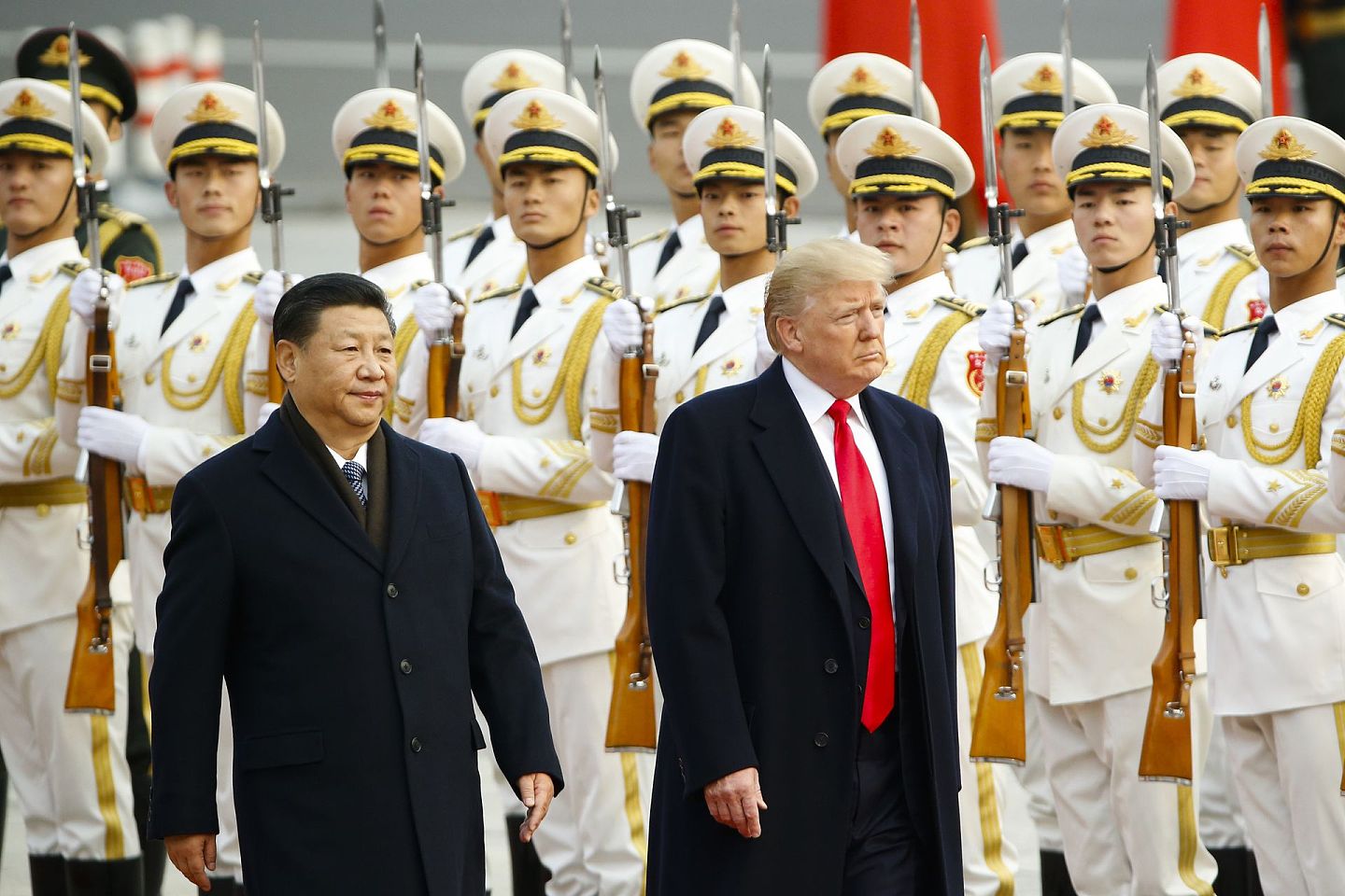 2017年11月，美国总统特朗普在习近平的陪同下，在北京参加为他举办的欢迎仪式。（Getty）