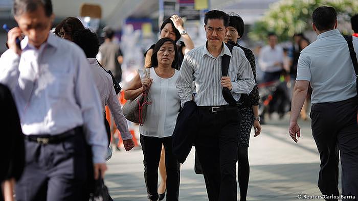 Hongkong Menschen auf dem Weg zur Arbeit (Reuters/Carlos Barria)