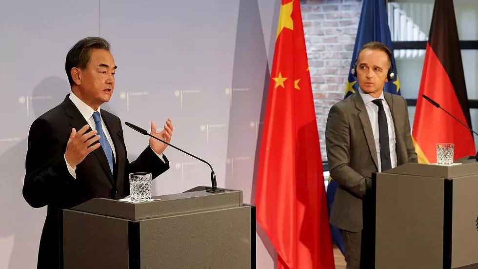 中国外长王毅与德国外长马斯资料图片