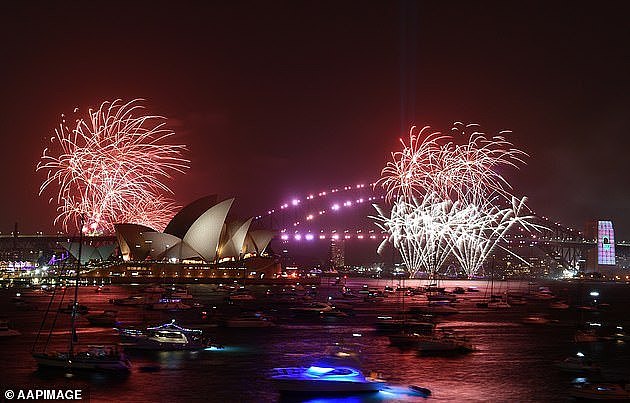 32664178-8887209-Sydney_s_world_famous_New_Year_s_Eve_firework_display_pictured_a-a-50_1603859173993.jpg,0