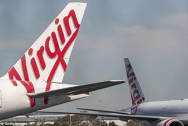 36872576-9055341-Virgin_Australia_Group_has_been_struggling_under_billions_of_dol-a-2_1608046853093.jpg,0