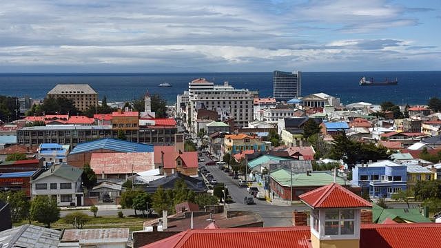 Rooftops / skyline of Punta Arenas, Patagonia, looking towards the sea / coastline. Chile. 2017