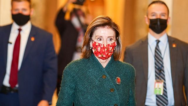 Speaker of the House Nancy Pelosi (D-CA) heads back to her office after she opened up the House floor on December 28, 2020 in Washington, DC