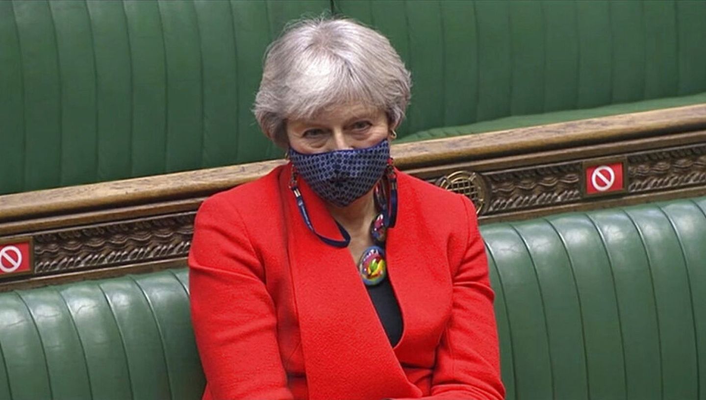 特蕾莎·梅12月30日看着约翰逊的英欧协议在下议院大比数过关，她可能会回想起自己脱欧协议在议会的三次历史性惨败。（美联社）
