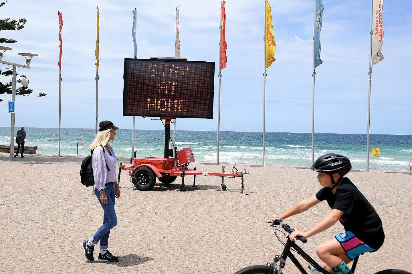 Stay at home sign at Manly Beach
