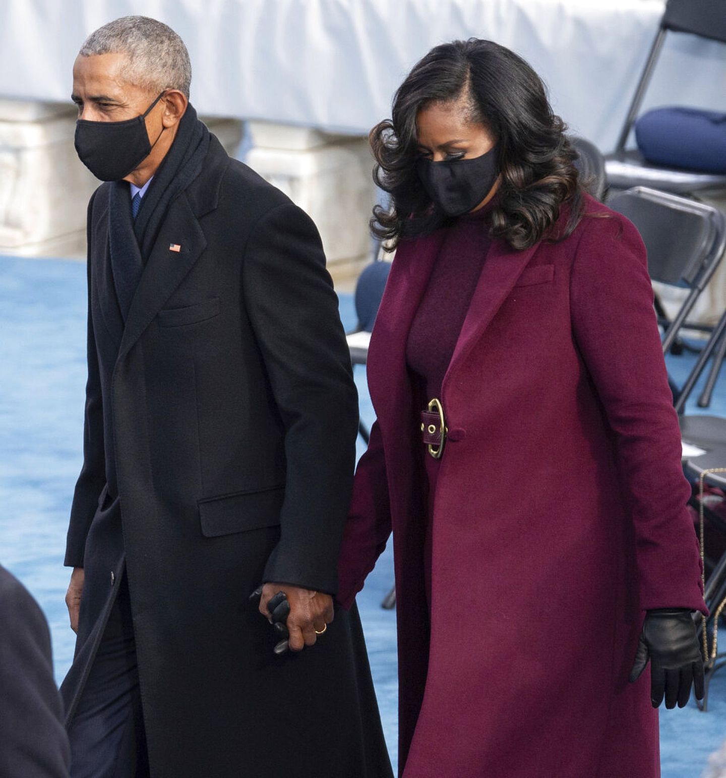 奥巴马与米歇尔都面戴口罩。（AP）