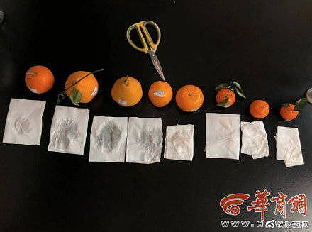中国食安问题频传，陕西省西安市的多个市场近日被踢爆出现「染色橘子」，只需要用卫生纸轻轻一擦，很快被染成红色，仔细闻还能闻到一股化工制剂的刺鼻味道。 （图取自微博）