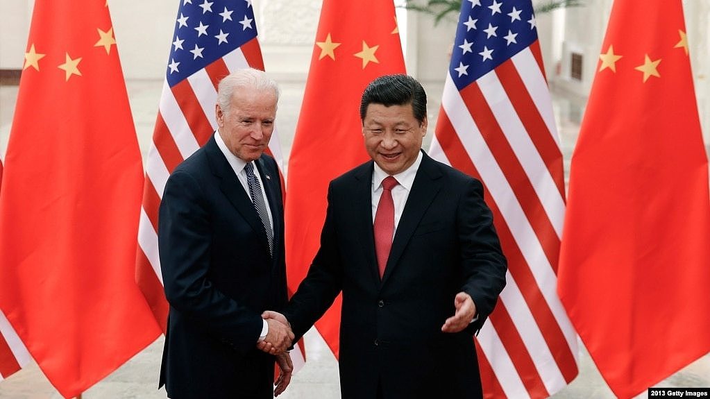 资料照：2013年12月4日拜登访问北京与中国国家主席习近平会面 