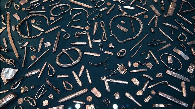 Museum display of some of the treasures displayed with the Sutton Hoo finds at The British Museum in London