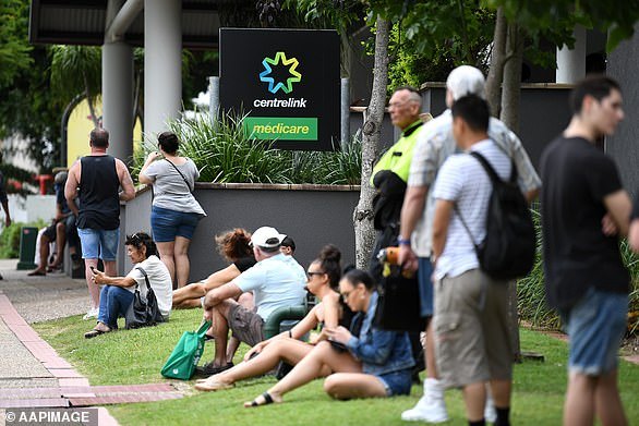 37564240-9318763-Pictured_People_are_seen_in_Centrelink_queues_in_Gold_Coast_back-a-41_1614734568361.jpg,0