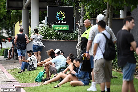 37564240-9318763-Pictured_People_are_seen_in_Centrelink_queues_in_Gold_Coast_back-a-41_1614734568361.jpg,0